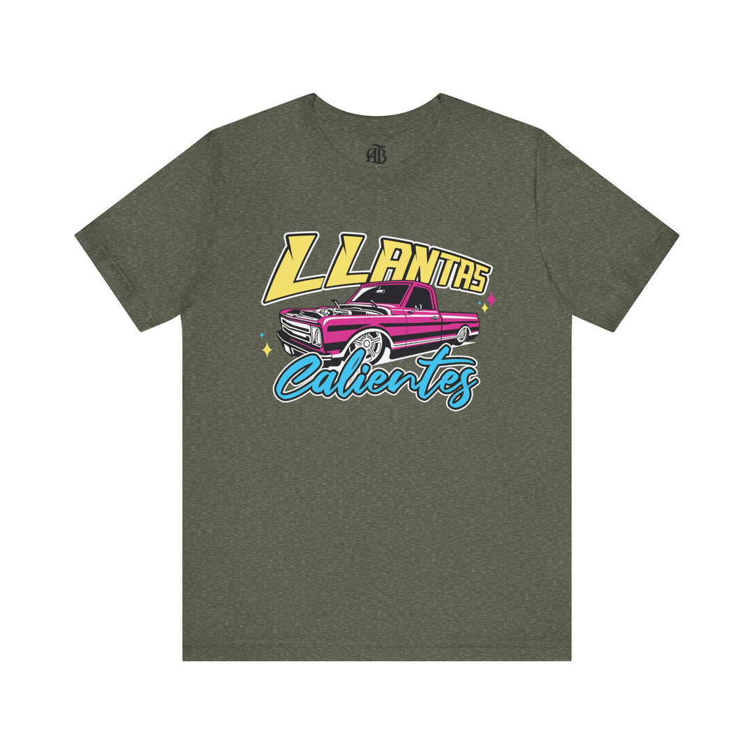 Bold cultural pride shirt with Llantas Calientes slogan for racing fans