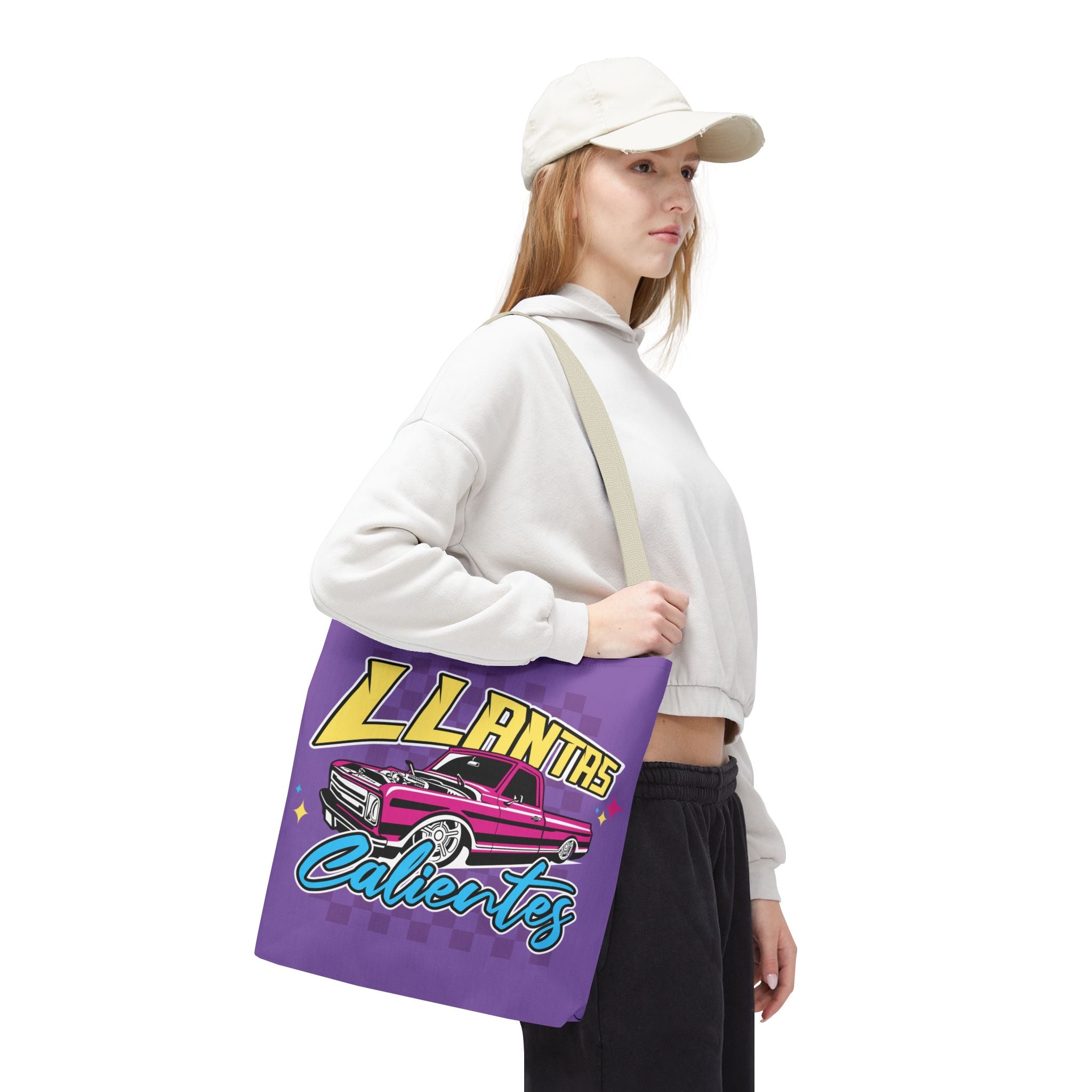 Stylish purple tote bag with bold Llantas Calientes graphic design