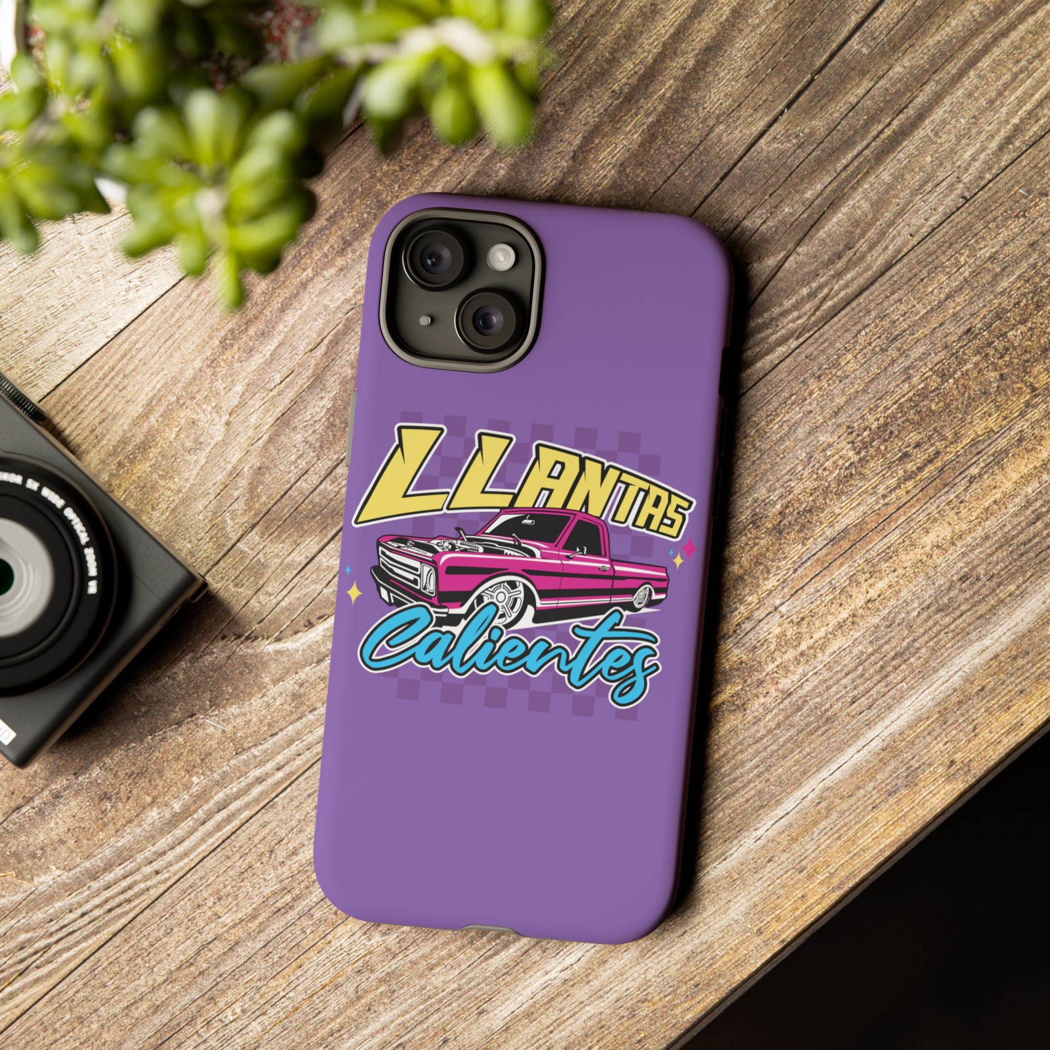 Stylish purple iPhone case with bold Llantas Calientes graphic