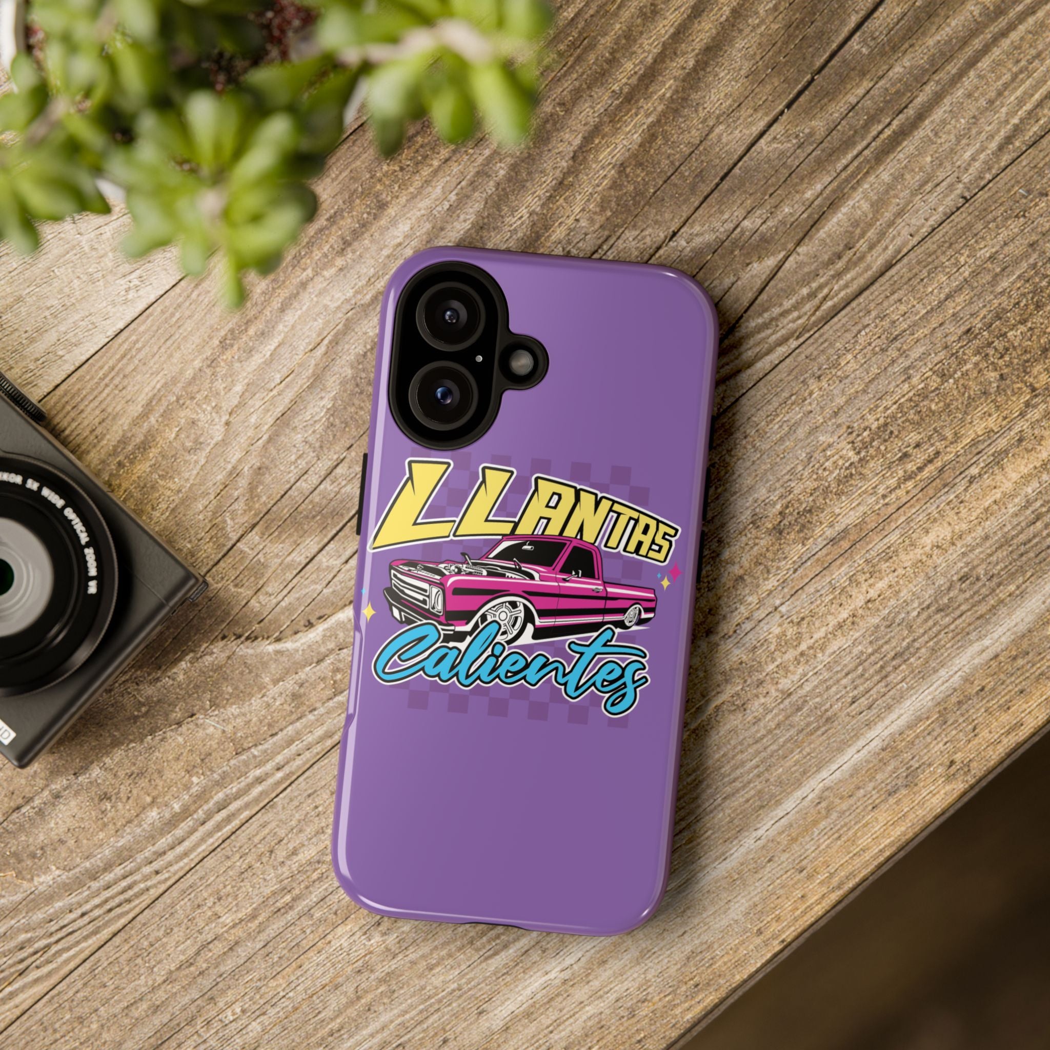 Stylish purple iPhone case with bold Llantas Calientes graphic