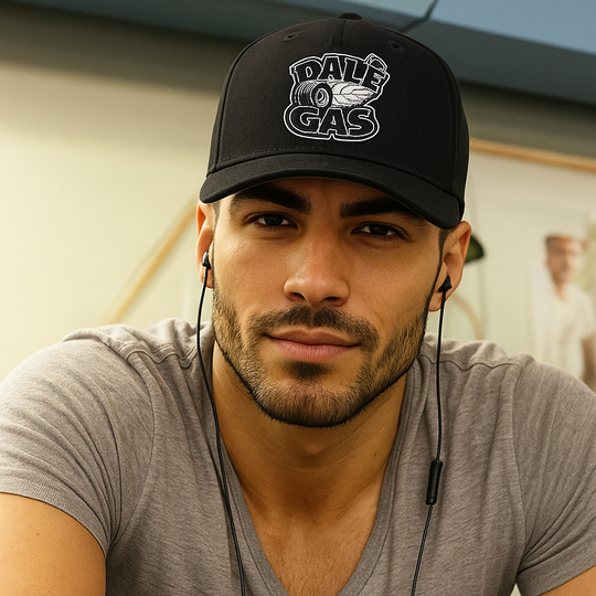 Dalè Gas Black hat on Hispanic male model with earbuds indoors