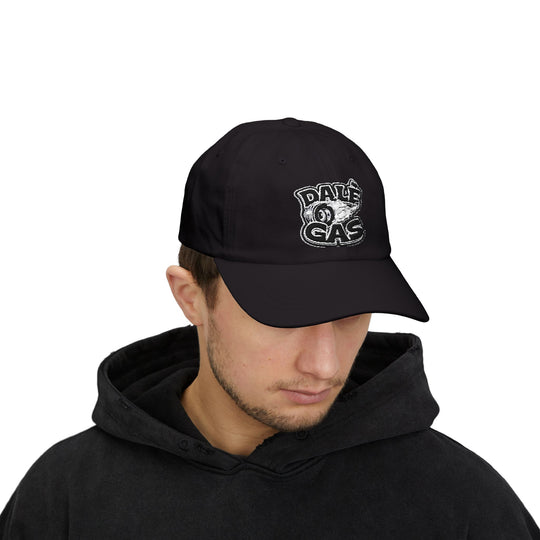 Lifestyle close-up of Dalè Gas Black hat with embroidered logo