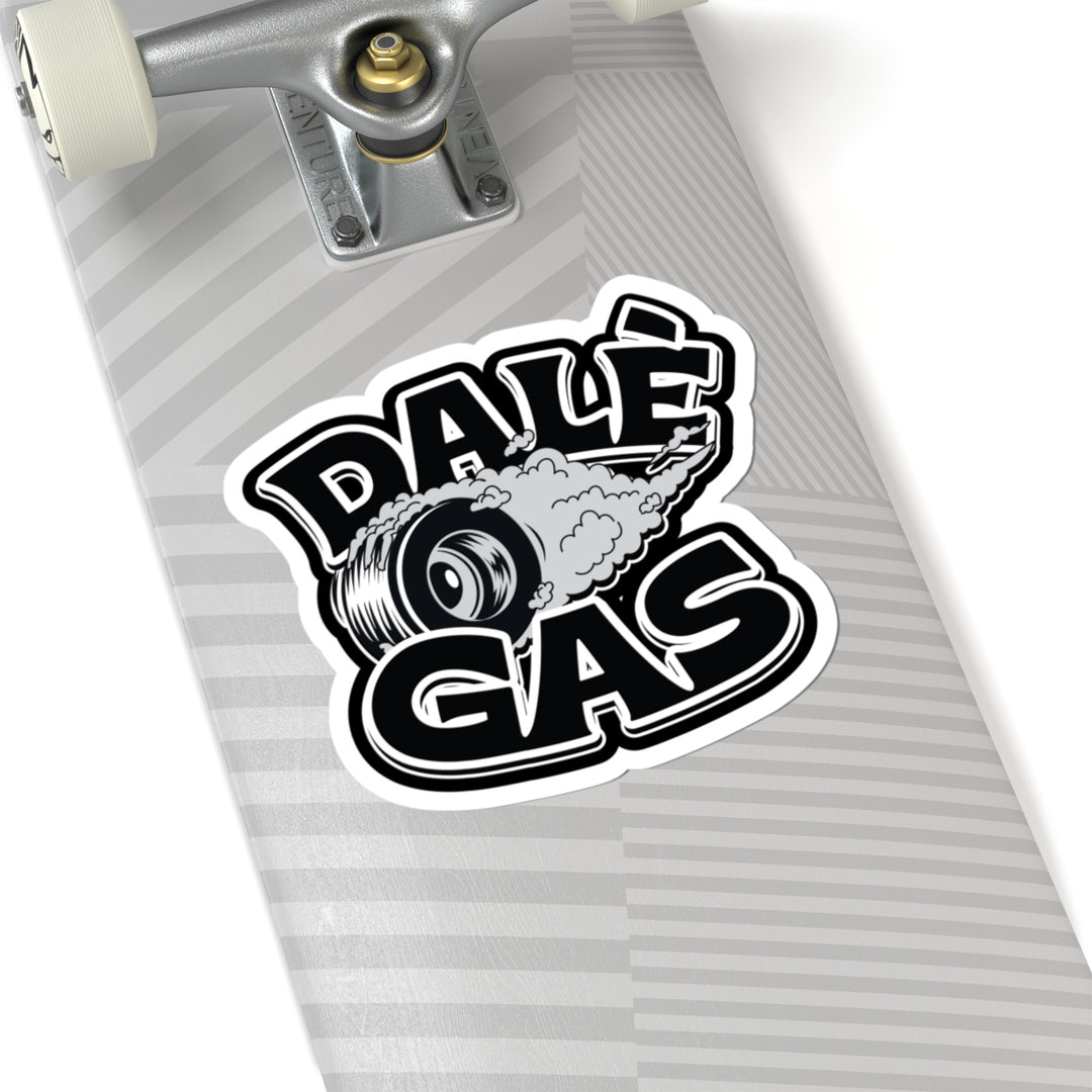 Skateboard with a 'Dalé Gas' sticker on a white background