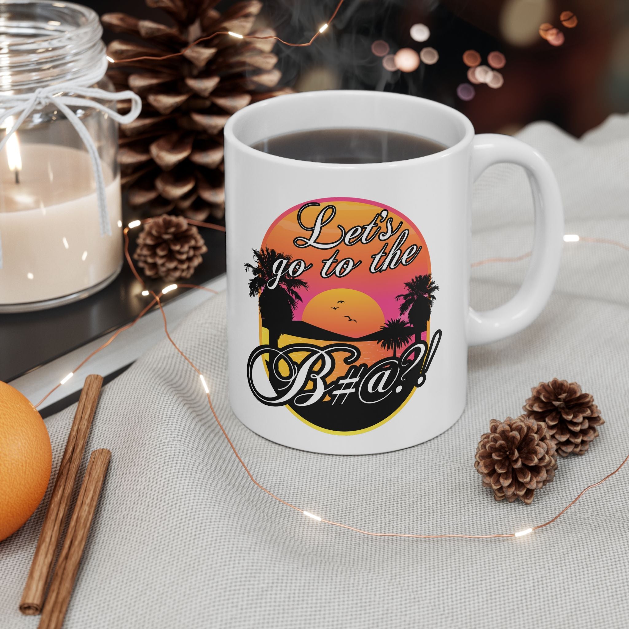 Lifestyle photo of Lets go to the bitch white ceramic mug on a kitchen counter