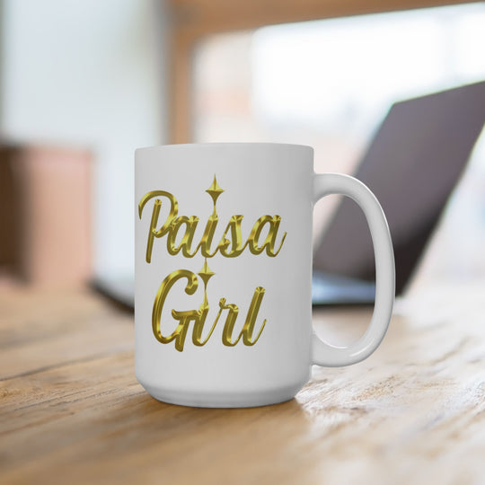 Close-up of Paisa Girl Ceramic mug with gold lettering on white ceramic surface.